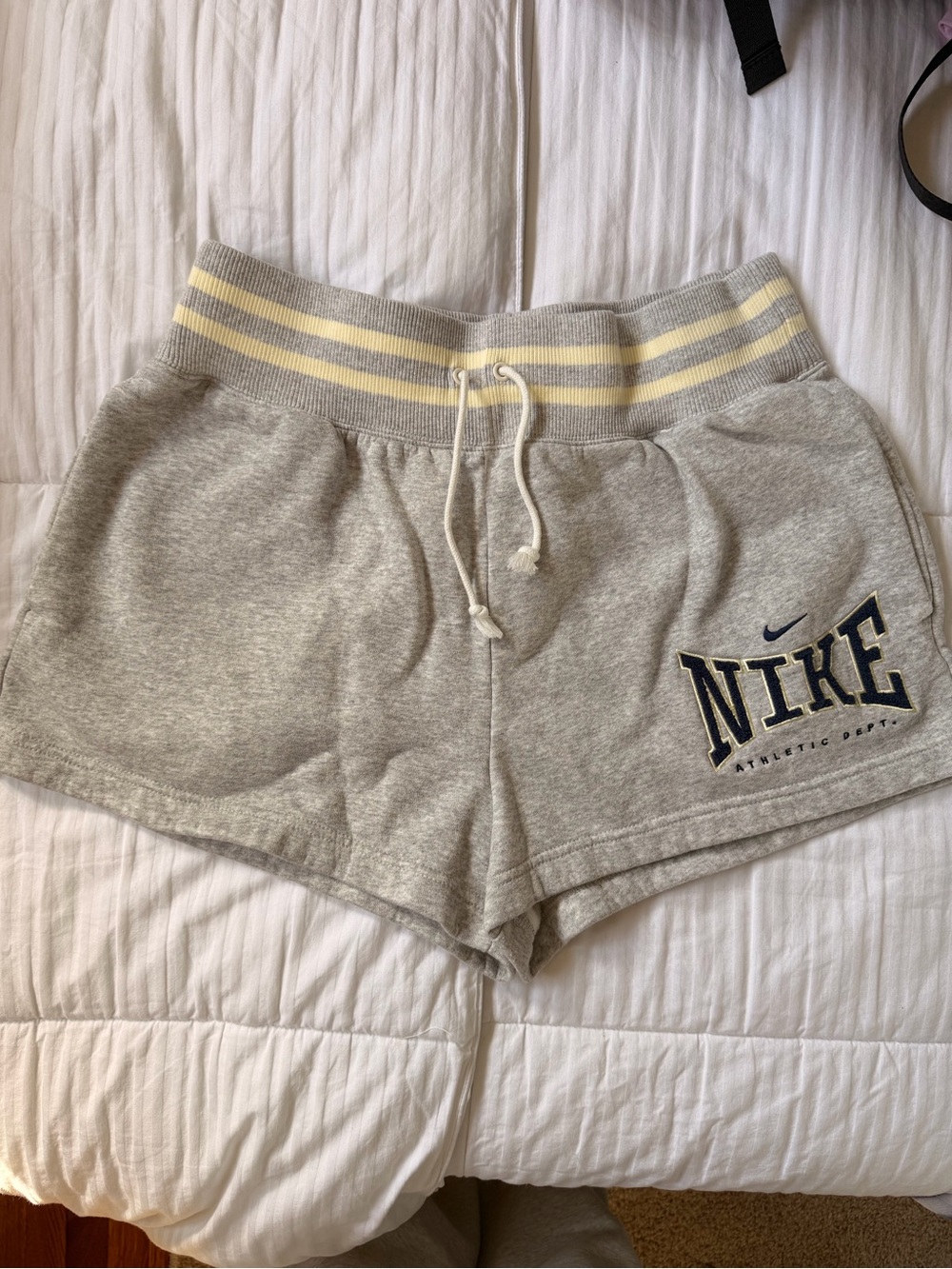 Nike Light Gray Athletic Shorts with Yellow Striped Waistband